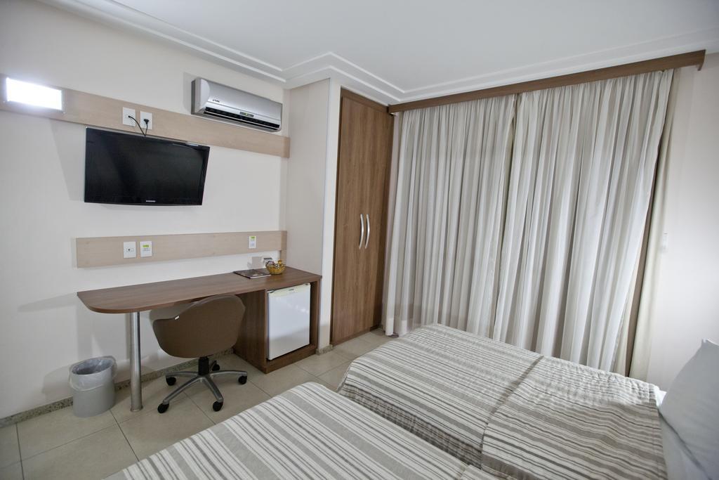 Quarto Premium Duplo (2 Adultos + 1 Criança)